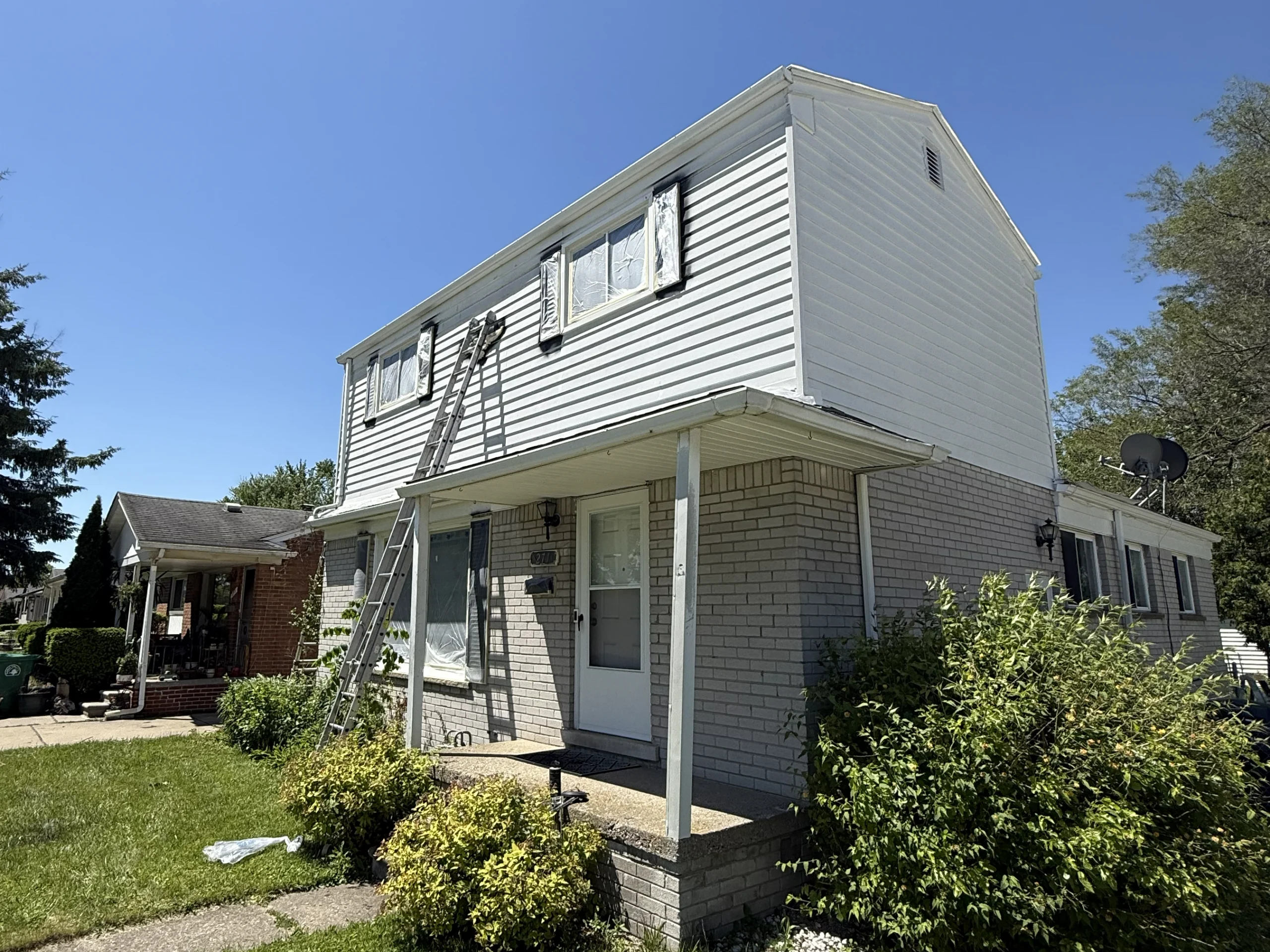 A photo of a residential home with a fresh exterior paint job
